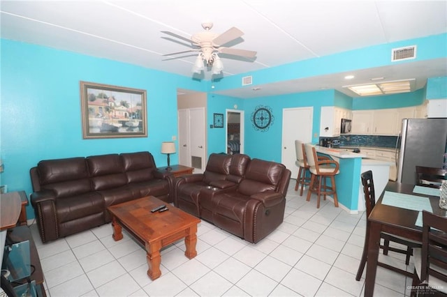 125 E Georgia Ruth Dr Unit B202, South Padre Island, TX 78597 - living room with ceiling fan, light tile patterned flooring, and visible vents