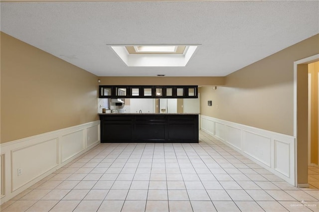301 E Ln Vista Ave Unit Ut26, Mcallen, TX 78501 - bar area with a decorative wall and wainscoting