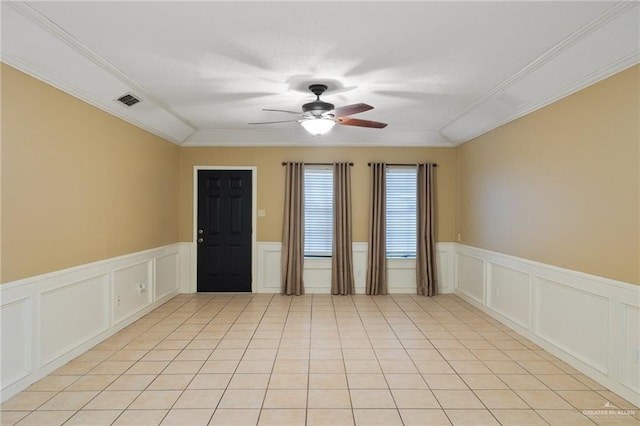 301 E Ln Vista Ave Unit Ut26, Mcallen, TX 78501 - unfurnished room with crown molding, ceiling fan, a decorative wall, and wainscoting