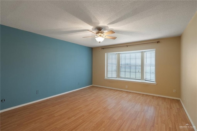 301 E Ln Vista Ave Unit Ut26, Mcallen, TX 78501 - empty room featuring light wood-type flooring, ceiling fan, a textured ceiling, and baseboards