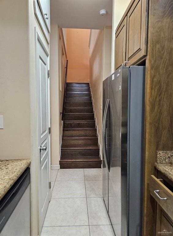 3109 S Casa Linda St, Mcallen, TX 78503 - staircase with tile patterned flooring
