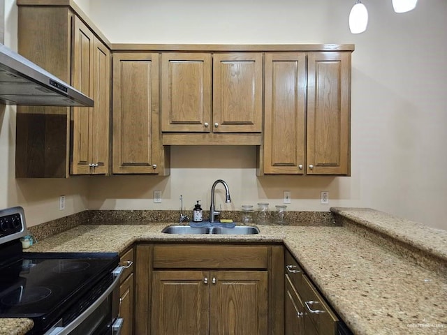 3109 S Casa Linda St, Mcallen, TX 78503 - kitchen featuring stainless steel electric range, wall chimney range hood, a sink, and light stone countertops