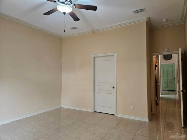 3109 S Casa Linda St, Mcallen, TX 78503 - unfurnished room with crown molding, a ceiling fan, baseboards, a smoke detector, and light tile patterned flooring