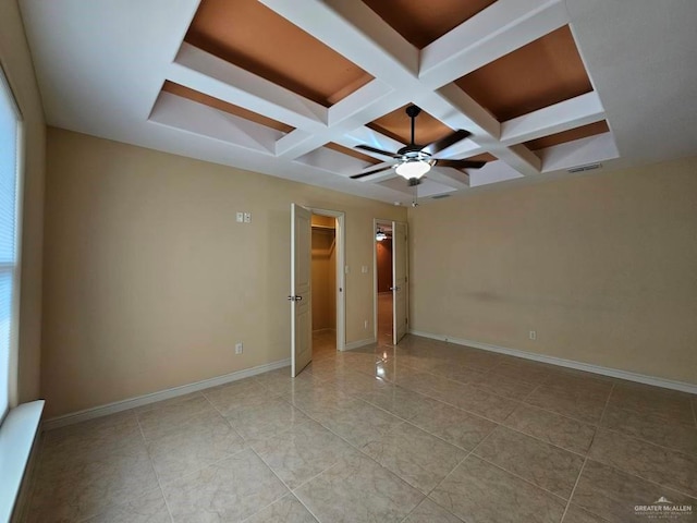 3109 S Casa Linda St, Mcallen, TX 78503 - spare room with coffered ceiling, ceiling fan, beamed ceiling, and baseboards