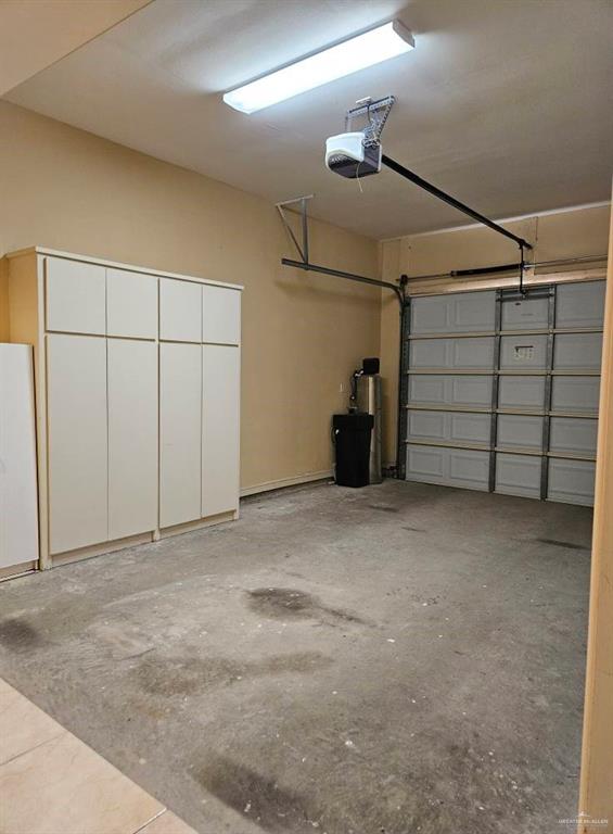 3109 S Casa Linda St, Mcallen, TX 78503 - garage with a garage door opener