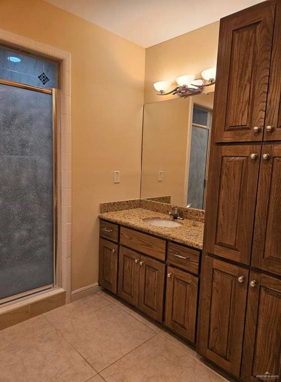 3109 S Casa Linda St, Mcallen, TX 78503 - full bath with a shower stall, vanity, and tile patterned floors