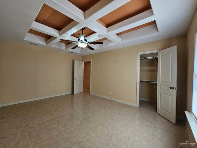 3109 S Casa Linda St, Mcallen, TX 78503 - unfurnished bedroom featuring coffered ceiling, beamed ceiling, a spacious closet, baseboards, and light tile patterned floors