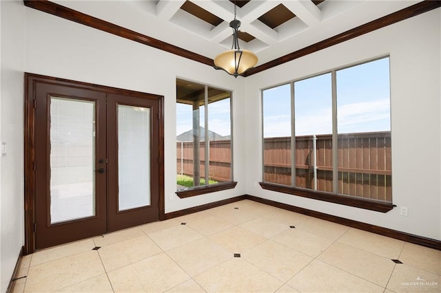 unfurnished sunroom featuring beam ceiling, french doors, and coffered ceiling