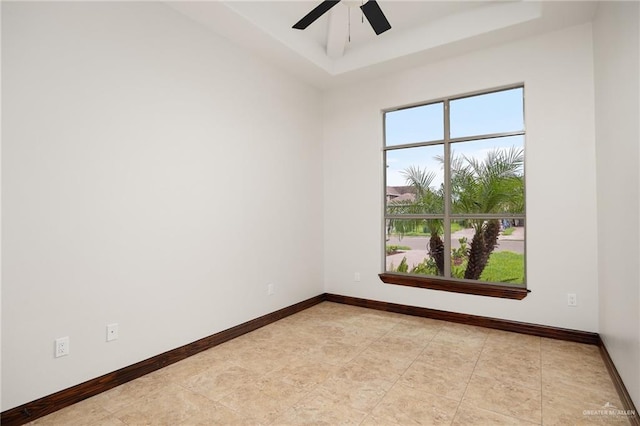 spare room with ceiling fan