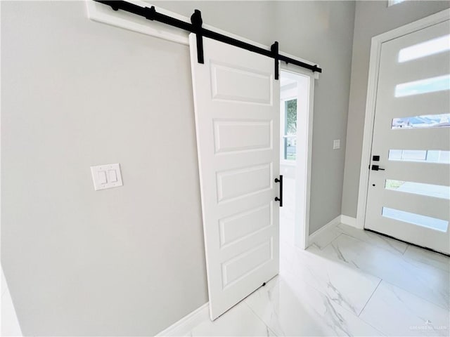 entryway with a barn door