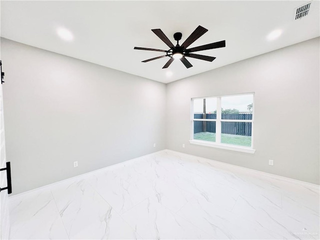 unfurnished room featuring ceiling fan and lofted ceiling