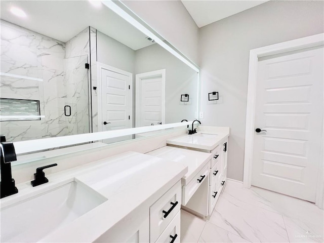 bathroom featuring vanity and an enclosed shower