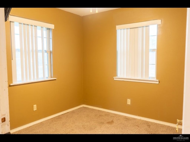 view of carpeted spare room