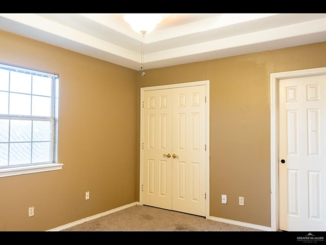 unfurnished bedroom with light carpet