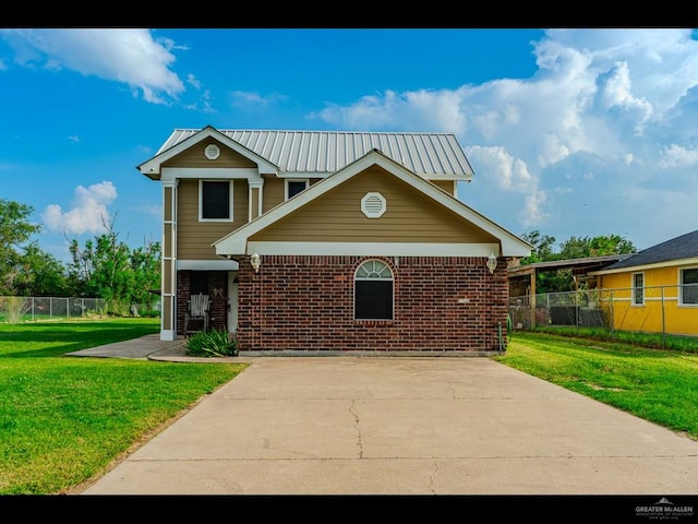 view of front of house with a front lawn