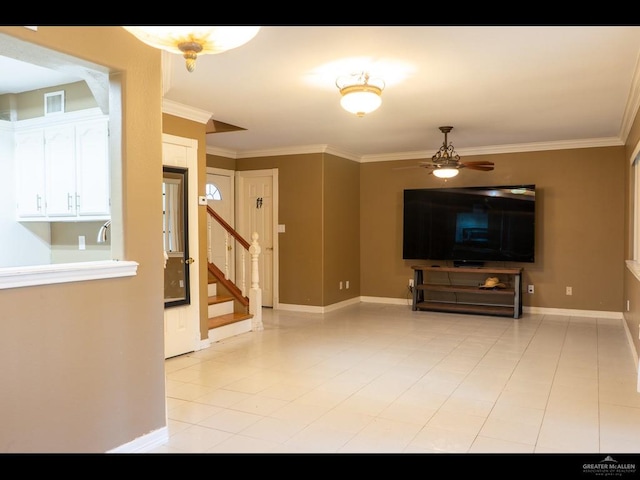 unfurnished living room featuring ceiling fan, light tile patterned flooring, and ornamental molding