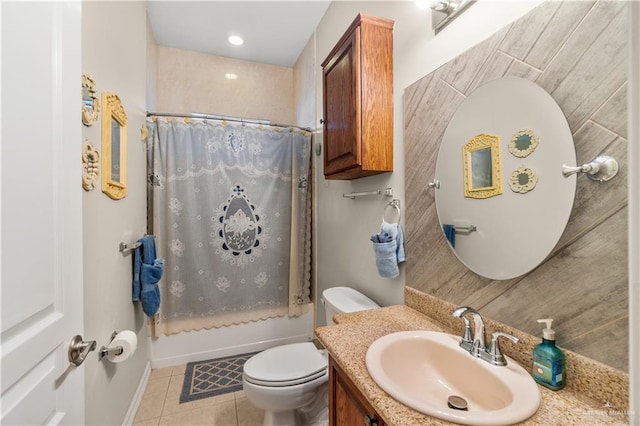 705 W Vinson Ave, Harlingen, TX 78550 - full bathroom featuring shower / bath combination with curtain, vanity, tile patterned floors, and toilet