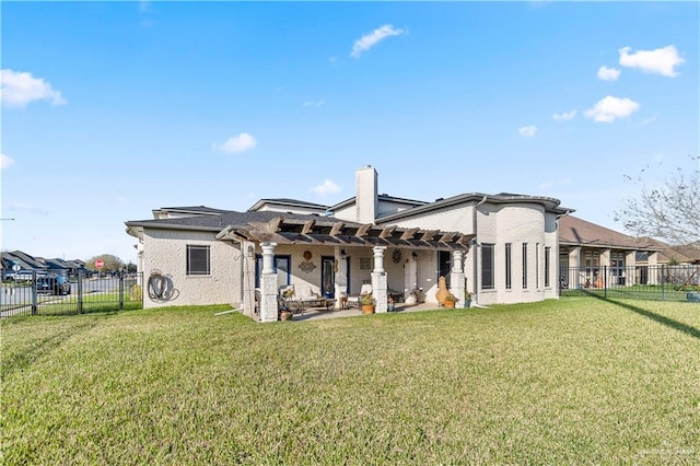 705 W Vinson Ave, Harlingen, TX 78550 - back of property with a yard, a pergola, and a patio