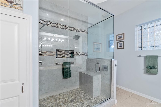 705 W Vinson Ave, Harlingen, TX 78550 - bathroom featuring a shower with door and tile patterned floors