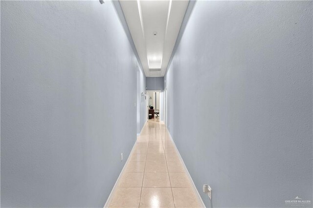 705 W Vinson Ave, Harlingen, TX 78550 - hallway with light tile patterned floors
