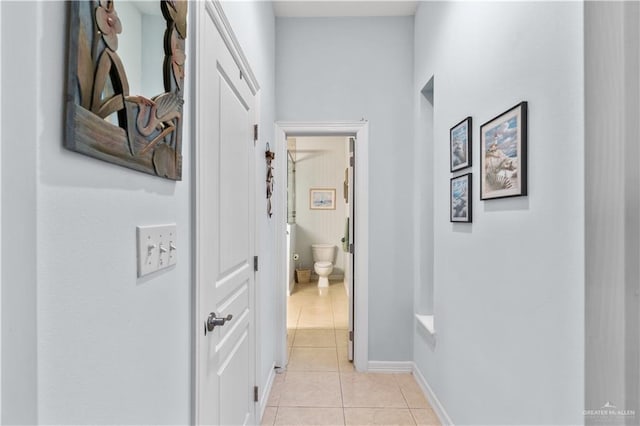 705 W Vinson Ave, Harlingen, TX 78550 - corridor featuring light tile patterned floors