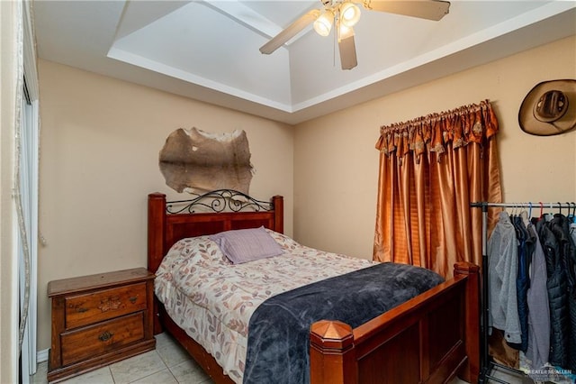 bedroom with light tile patterned flooring and ceiling fan