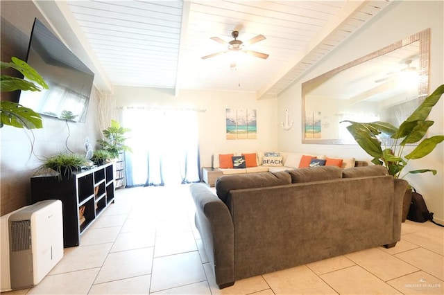 6608 Padre Blvd, South Padre Island, TX 78597 - living room with a ceiling fan, light tile patterned floors, and a wooden ceiling with exposed beams