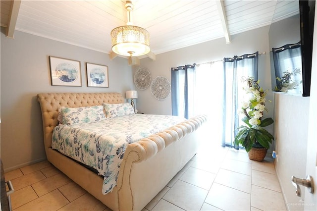 6608 Padre Blvd, South Padre Island, TX 78597 - bedroom with a wood ceiling with exposed beams and light tile patterned floors