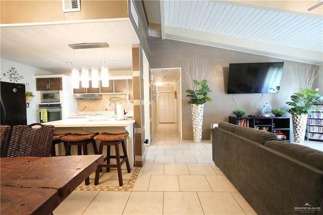 6608 Padre Blvd, South Padre Island, TX 78597 - living area featuring light tile patterned flooring