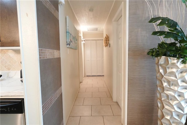 6608 Padre Blvd, South Padre Island, TX 78597 - hallway featuring light tile patterned floors and baseboards