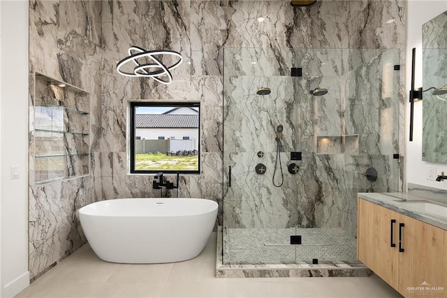 1620 S Ongar Ln, Edinburg, TX 78539 - bathroom with a marble finish shower, a freestanding bath, and vanity