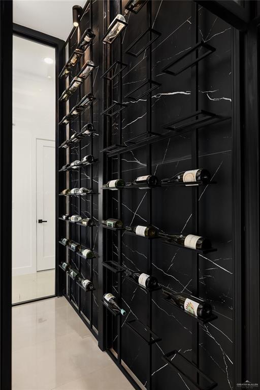 1620 S Ongar Ln, Edinburg, TX 78539 - wine cellar with light tile patterned floors