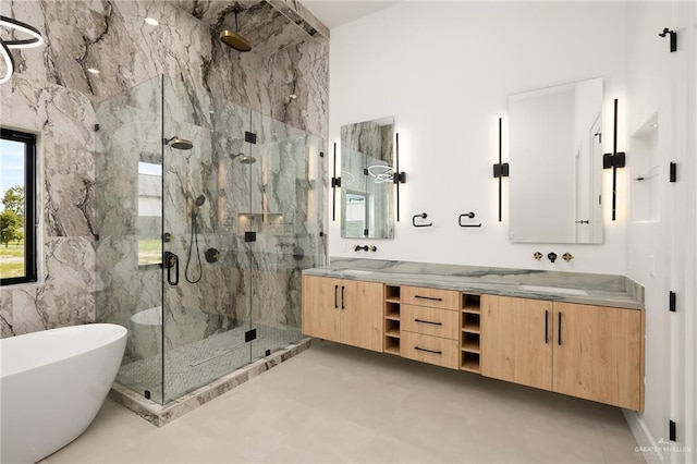 1620 S Ongar Ln, Edinburg, TX 78539 - bathroom with a marble finish shower, double vanity, and a soaking tub