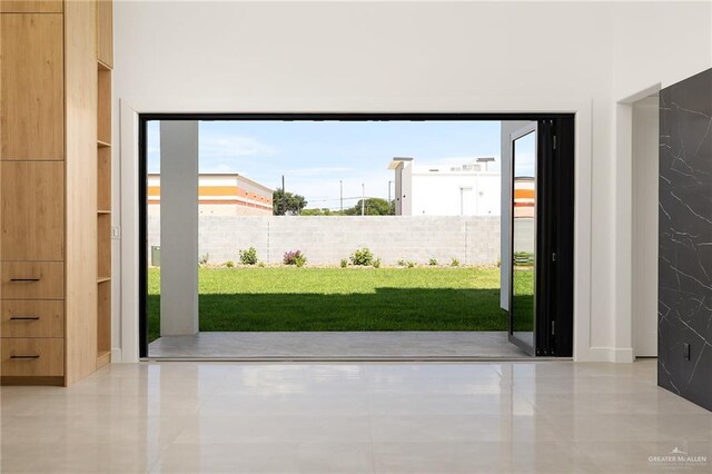 1620 S Ongar Ln, Edinburg, TX 78539 - doorway to outside featuring tile patterned flooring