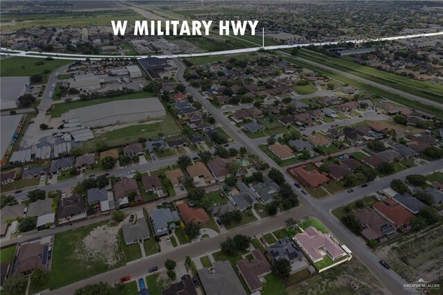 1806 E Flora Ave, Hidalgo, TX 78557 - aerial view of property and surrounding area featuring nearby suburban area
