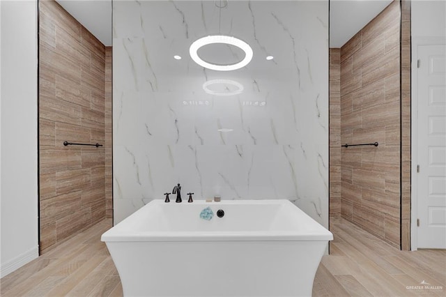 1320 S Cesar Chavez Rd, Edinburg, TX 78542 - full bath with tile walls and a freestanding bath
