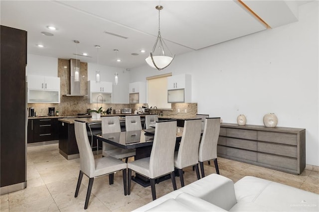 dining area with light tile patterned floors