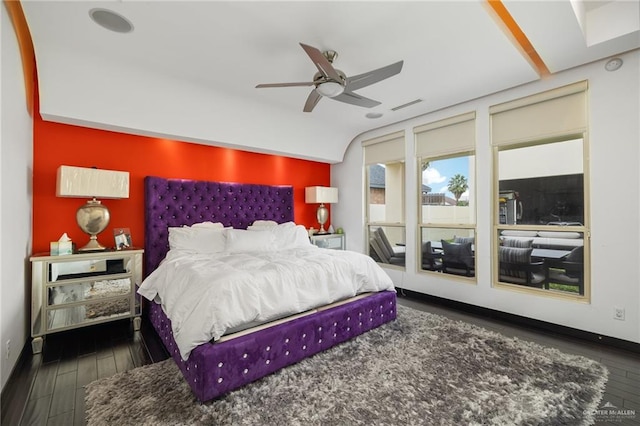 bedroom featuring ceiling fan and dark wood-type flooring