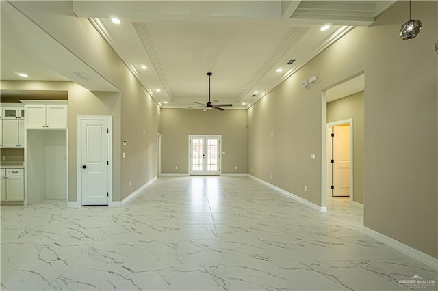 spare room featuring a ceiling fan, french doors, marble finish floor, and baseboards