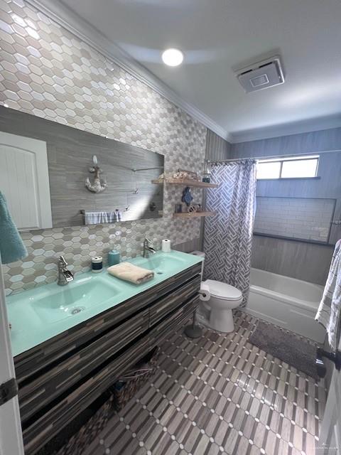 full bathroom with shower / bathtub combination with curtain, backsplash, crown molding, toilet, and vanity