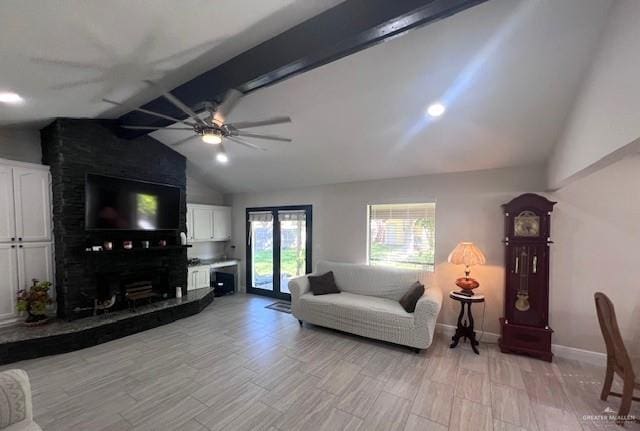 living room with ceiling fan, french doors, lofted ceiling with beams, and light hardwood / wood-style floors