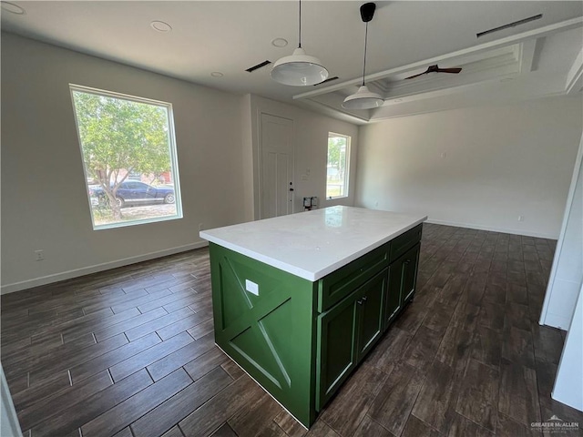 808 E Evans Ave, Pharr, TX 78577 - kitchen featuring green cabinetry, dark wood-style flooring, coffered ceiling, open floor plan, and a kitchen island