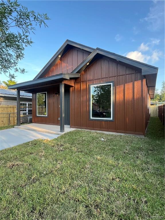 808 E Evans Ave, Pharr, TX 78577 - view of front of house with board and batten siding and a patio