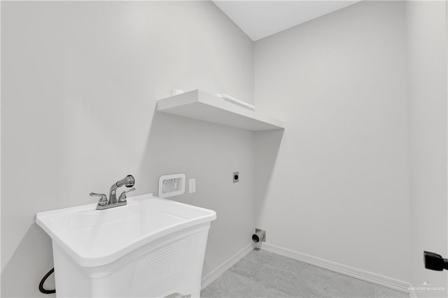 laundry area featuring electric dryer hookup, light carpet, sink, and washer hookup