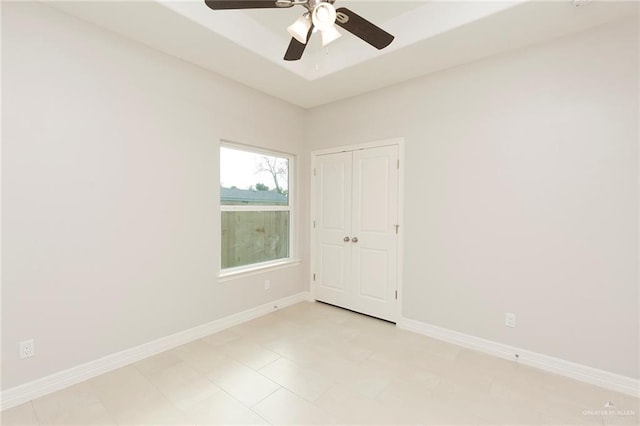 unfurnished room featuring ceiling fan