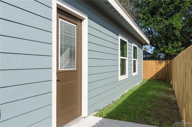 view of home's exterior featuring a lawn