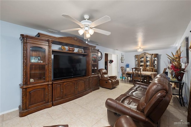 living room with ceiling fan