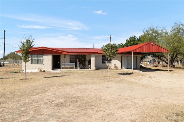 exterior space featuring a carport