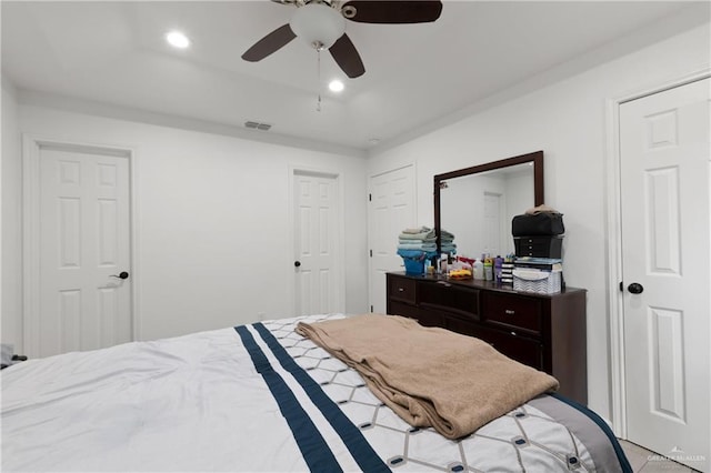 bedroom with recessed lighting, visible vents, and ceiling fan