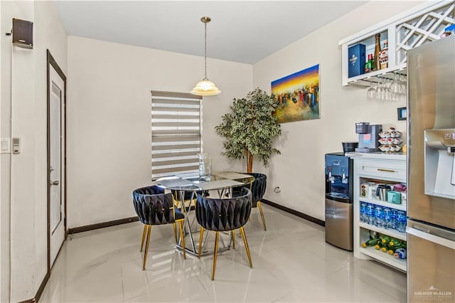 dining room with light tile patterned flooring